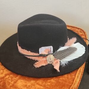 Black Hat with Feather and Ribbon Accent